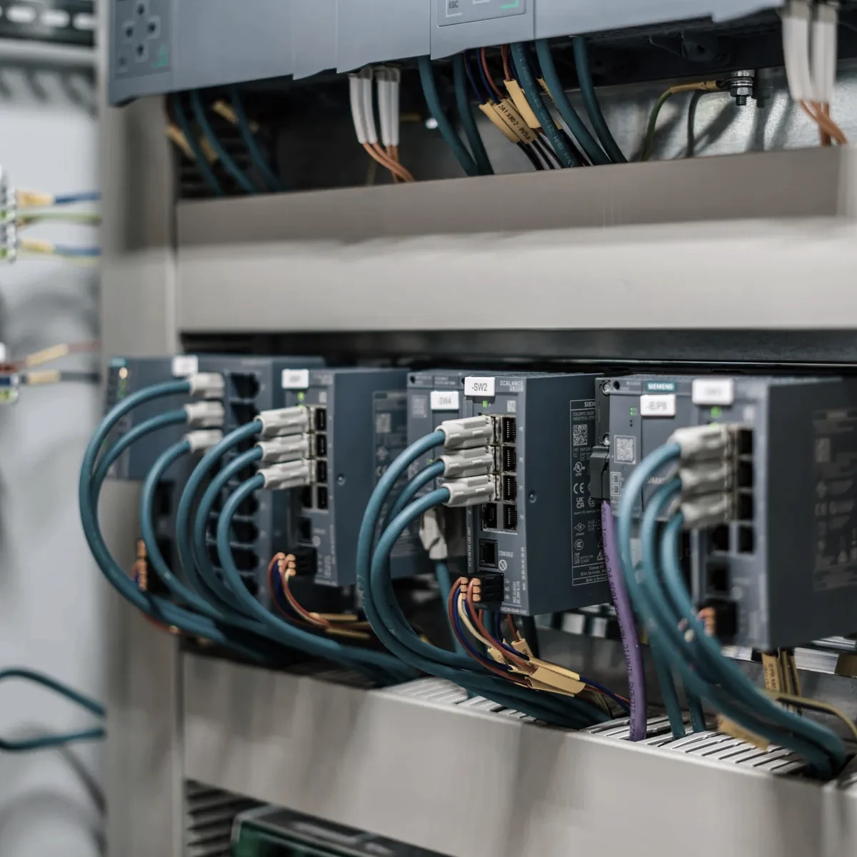 Industrial control panel with electronic modules and wiring